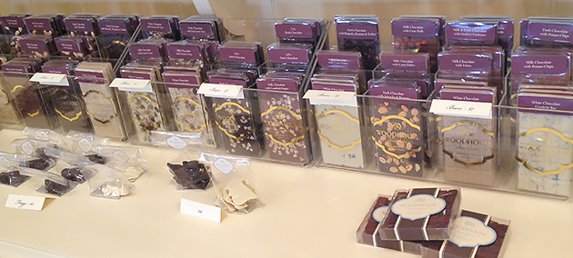 Woodhouse Chocolates’ bar selection stretches along the back wall of the store.
