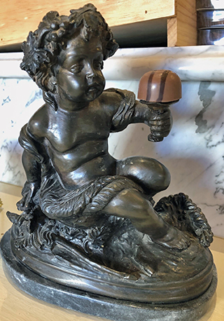 boy with truffle statue